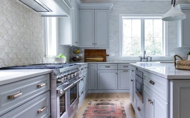 Gray kitchen with a professional range